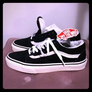 Black and white Vans with shearling inside